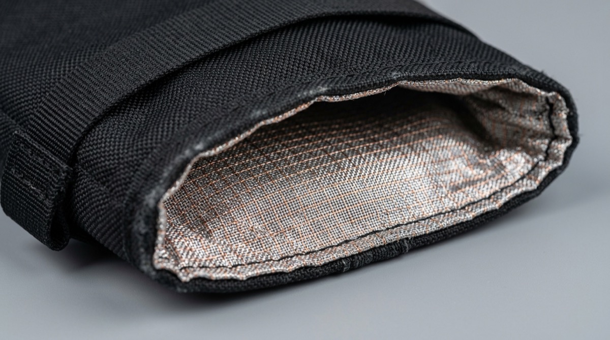 Close-up of nickel-coated conductive fabric used in Faraday bag shielding