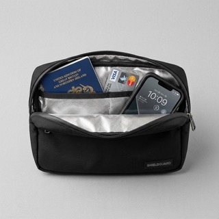 Passport and phone in a Faraday travel organizer